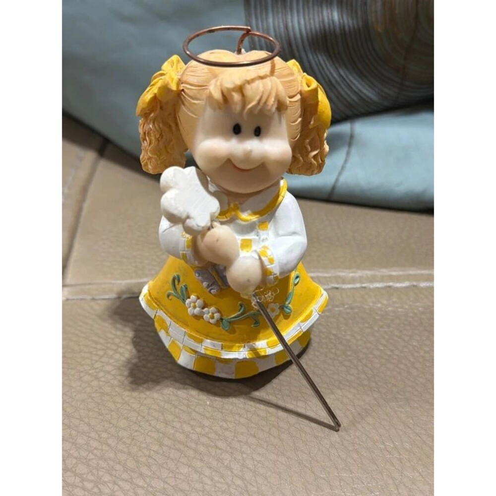 vintage Tender Moments (by United Design) yellow daisy angel figurine.